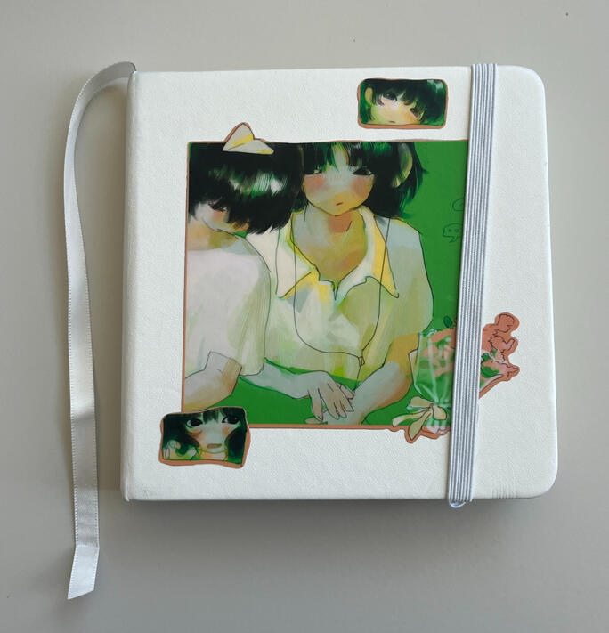 stickers on sketchbook